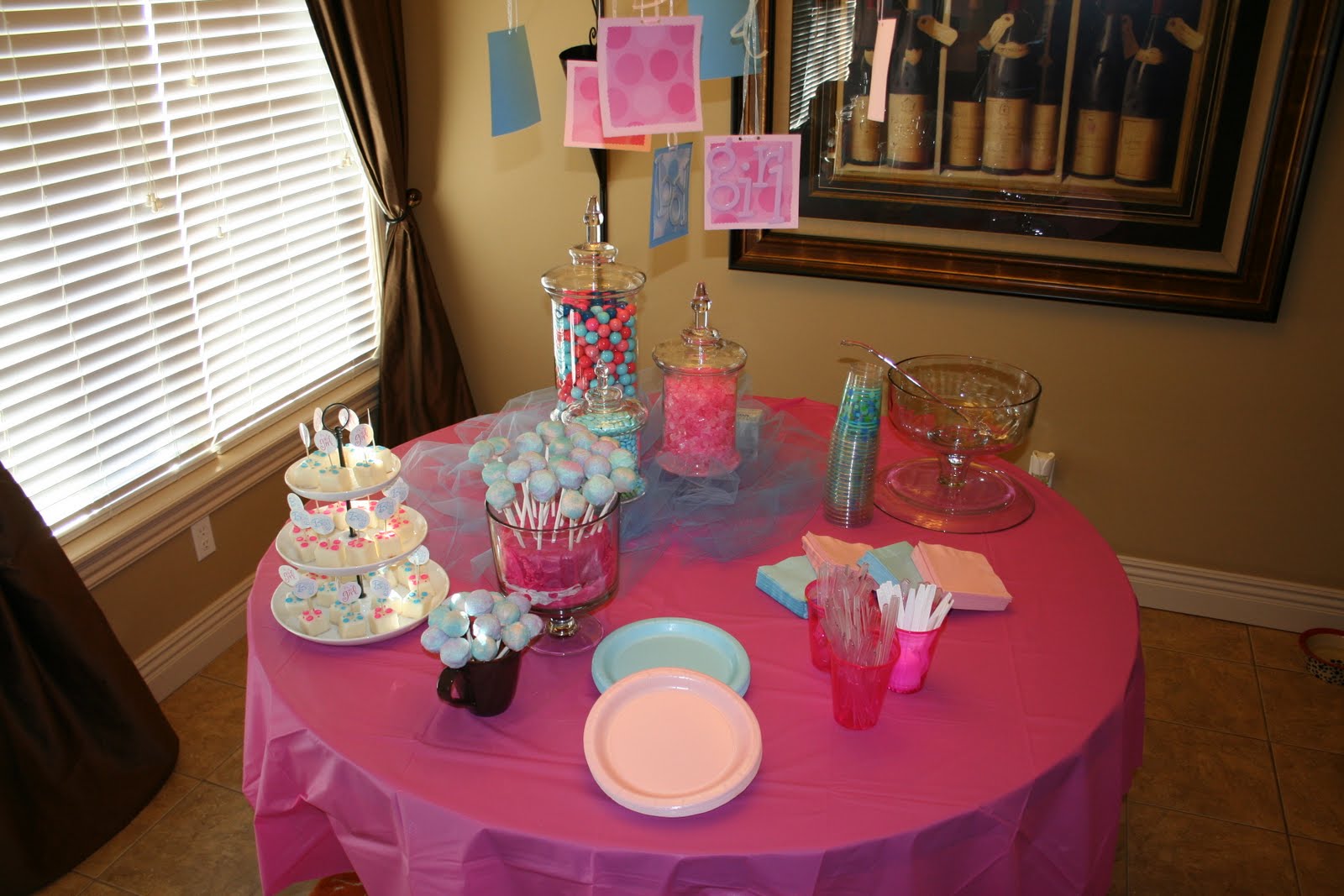 DIY baby gender reveal party pink blue tablescape