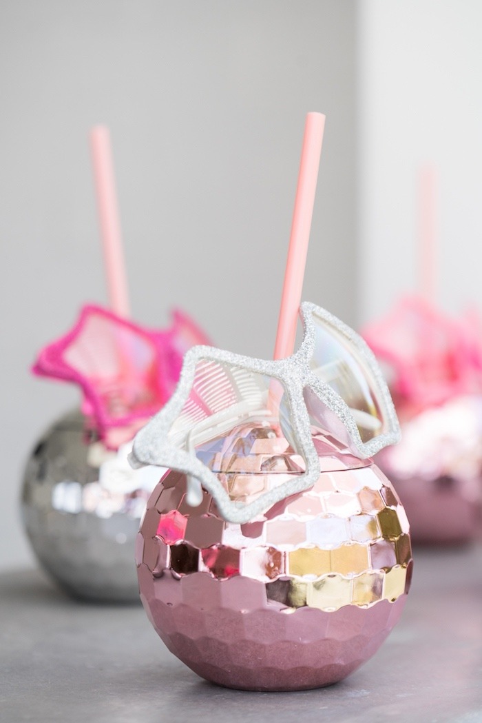 What a cute idea for a rock star themed birthday party! Get event inspo here. #birthdayinspo #rockandroll #partyinspo #rockon #kidspartyideas #sendomatic #discoballs