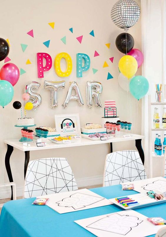 Love this rock star themed birthday party! Get party inspo here. #birthdayinspo #rockandroll #partyinspo #rockon #kidspartyideas #sendomatic #balloons #party #popstar